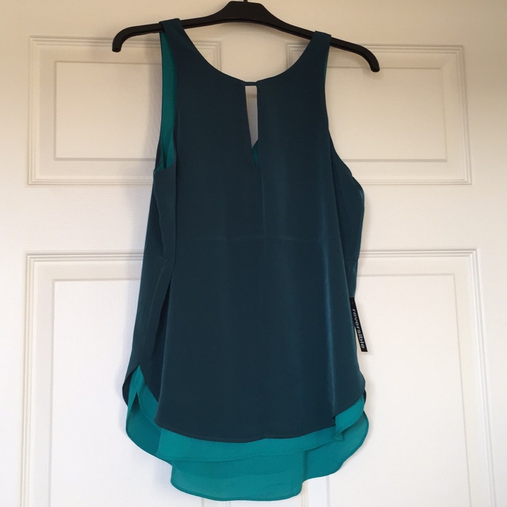 Keyhole reversible tank